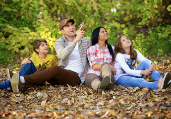 Fototapeta premium Sitting in the park and looking up