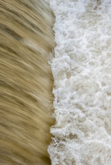 foaming water at a weir