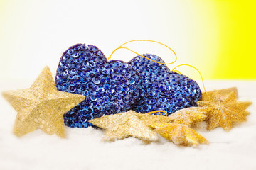 christmas decoration with stars over snow