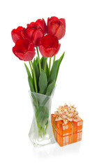 Tulips in vase and gift box with tape