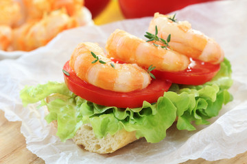 Delicious fresh shrimp sandwich with lettuce and tomatoes