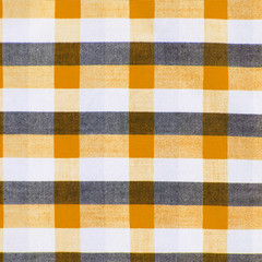orange, black and white checkered pattern texture.