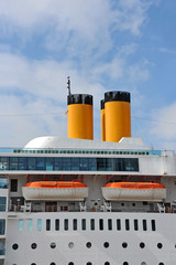 Safety lifeboat and chimney of a cruise ship