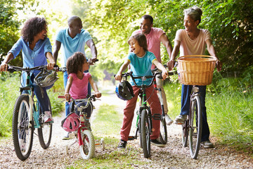 Fototapeta na wymiar Multi Generation African American Family On Cycle Ride