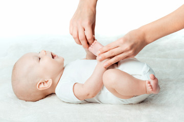 Obraz na płótnie Canvas Baby with mum is making massage