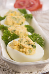 Stuffed eggs with parsley and mayonnaise