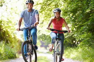  Couple On Cycle Ride In Countryside © Monkey Business