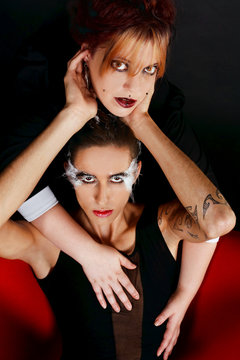 Fashion portrait of a woman and androgynus man