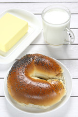 Croissant on a plate and wooden table