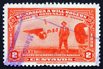 Postage stamp Nicaragua 1939 Will Rogers Standing beside Plane