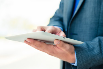 Businessman using tablet computer