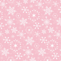 Seamless vector pattern - white snowflakes on pink background