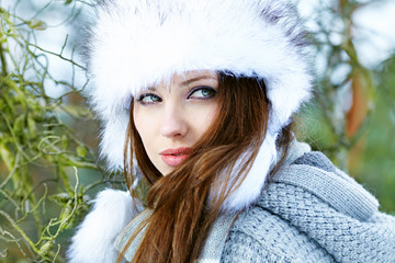 Young woman winter portrait. Shallow dof.