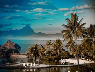 A sunset over ocean and   mountain. Polynesia. Tahiti, - obrazy, fototapety, plakaty