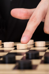 Businessman Playing Checkers