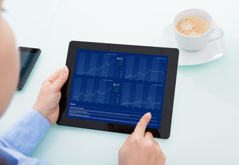 Businesswoman Pointing On Digital Tablet