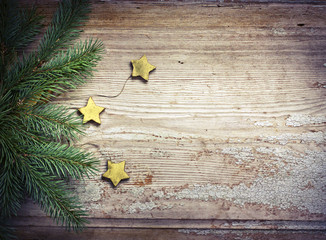 Vintage Christmas decorations on rustic wooden background