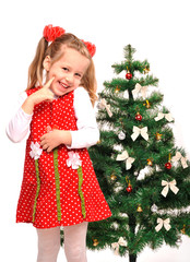 Little girl and christmas tree