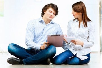 Two students smiling