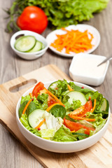 Fresh salad with tomato, cucumber and carrots
