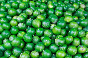 Fresh green lemon in the market.