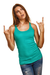 woman girl shows sign devil rock metal in jeans isolated studio