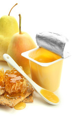 Tasty desserts in open plastic cups and honey combs, fruits,