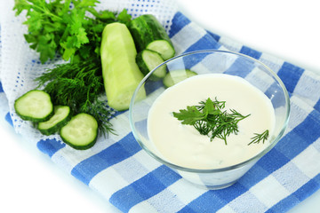 Cucumber yogurt in glass bowl,