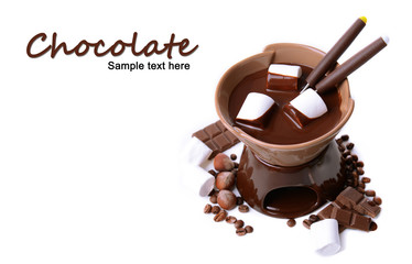 Chocolate fondue with marshmallow candies, isolated on white