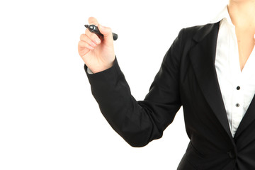 Human hand writing at blank transparent whiteboard