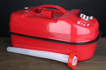 Red diesel canister on grey background
