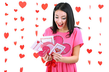 Fototapeta premium Attractive young woman with cards on Valentine Day