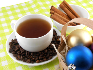 Christmas decoration with cup of coffee, beans, cinnamon