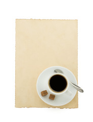 cup of coffee and parchment on white