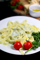 Traditional Italian food tagliatelle with ingredients