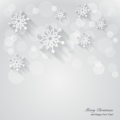 Christmas background with paper snowflakes.