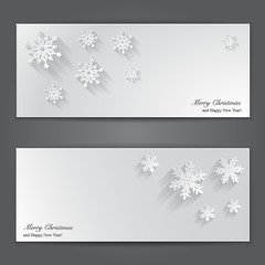 Fototapeta na wymiar Christmas banners with paper snowflakes.