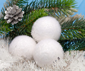 Fototapeta na wymiar White fluffy New Year's balls