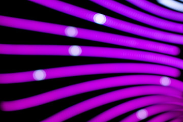 Neon abstract background of lines and bokeh