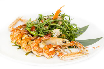 shrimp salad greens vegetables and crayfish in the restaurant