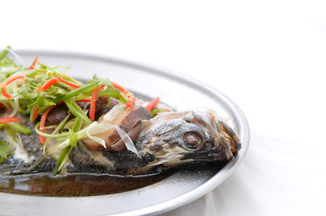 Snapper fish with soy sauce is steamed