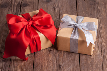 two gift boxes on wooden background