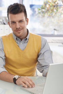 Office portrait of young businessman smiling