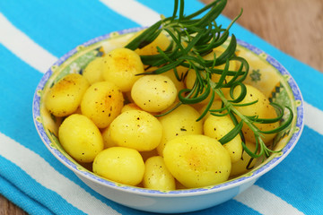 Roasted baby potatoes with rosemary, close up