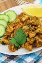 Spicy chicken with fresh coriander