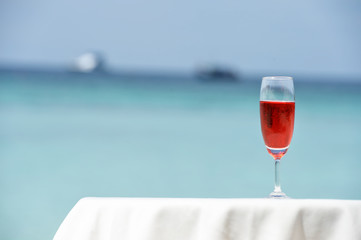 cocktail glass kept on sea beach