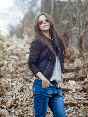 Fashion model wearing sunglasses - outdoor portrait