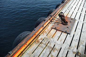 Mooring equipment on wooden pier in Norway