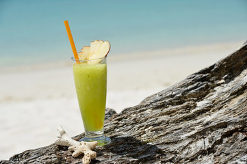 Fresh fruit cocktail juice on the beach