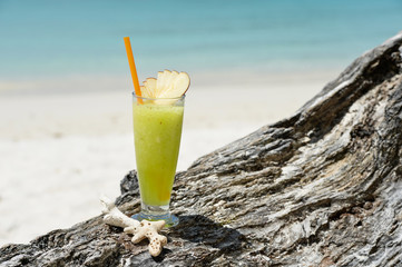 Fresh fruit cocktail juice on the beach